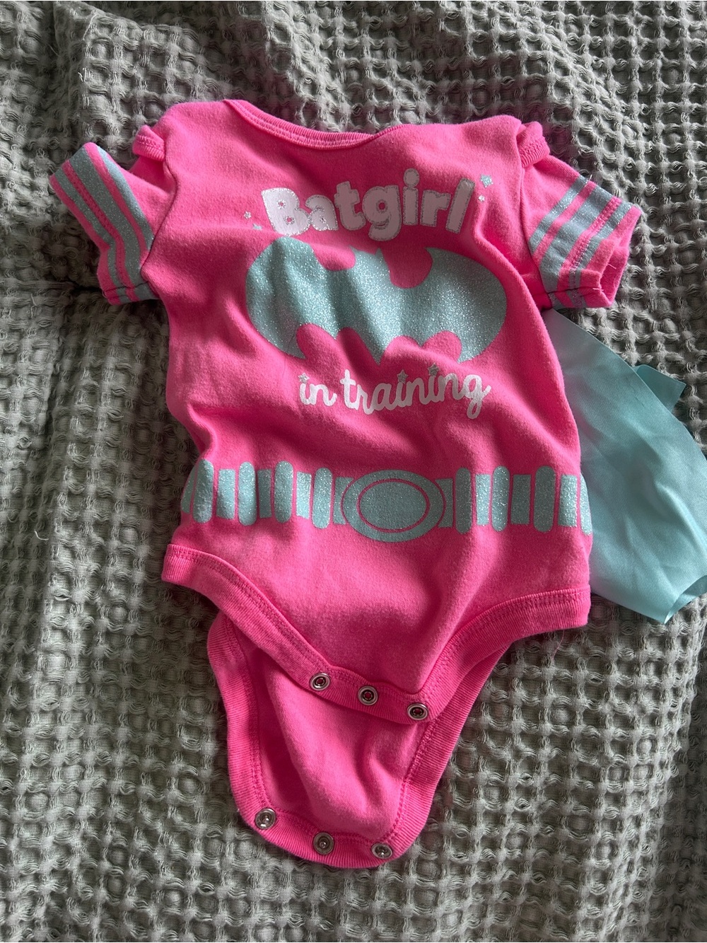 Batman Pink Batgirl 'In Training' One-Piece with Light Blue Emblem